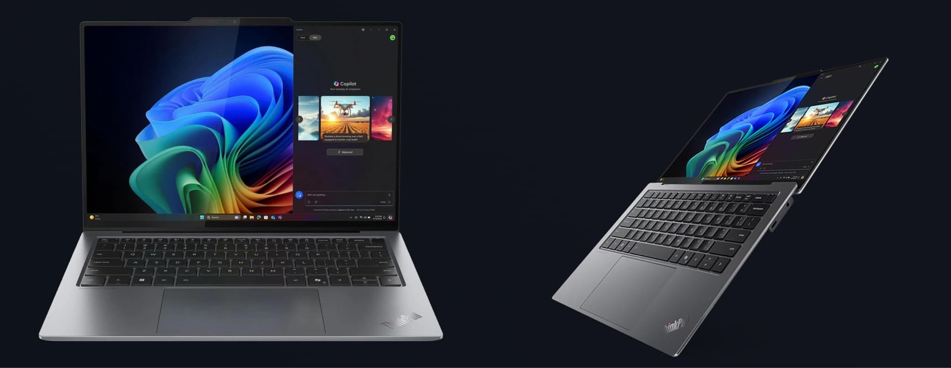 Two sleek laptops are showcased, both displaying vibrant screens with colorful graphics. One is open, the other is half-closed, angled from different perspectives.